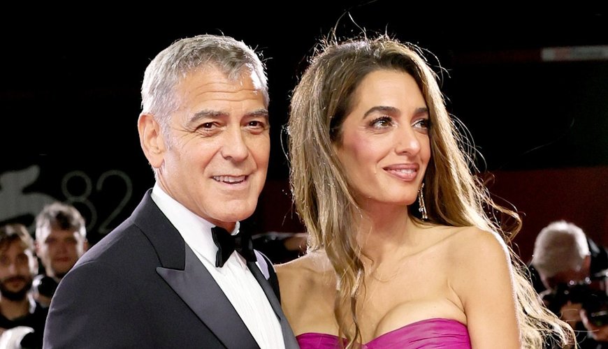 Amal Clooney Slays Venice Film Festival with Bold Fuchsia Glam - Hollywood Power Couple Alert!