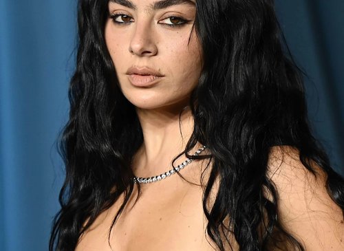 Charli XCX Slays Summer Style with a Chic Gucci LBD and Vibrant Heels