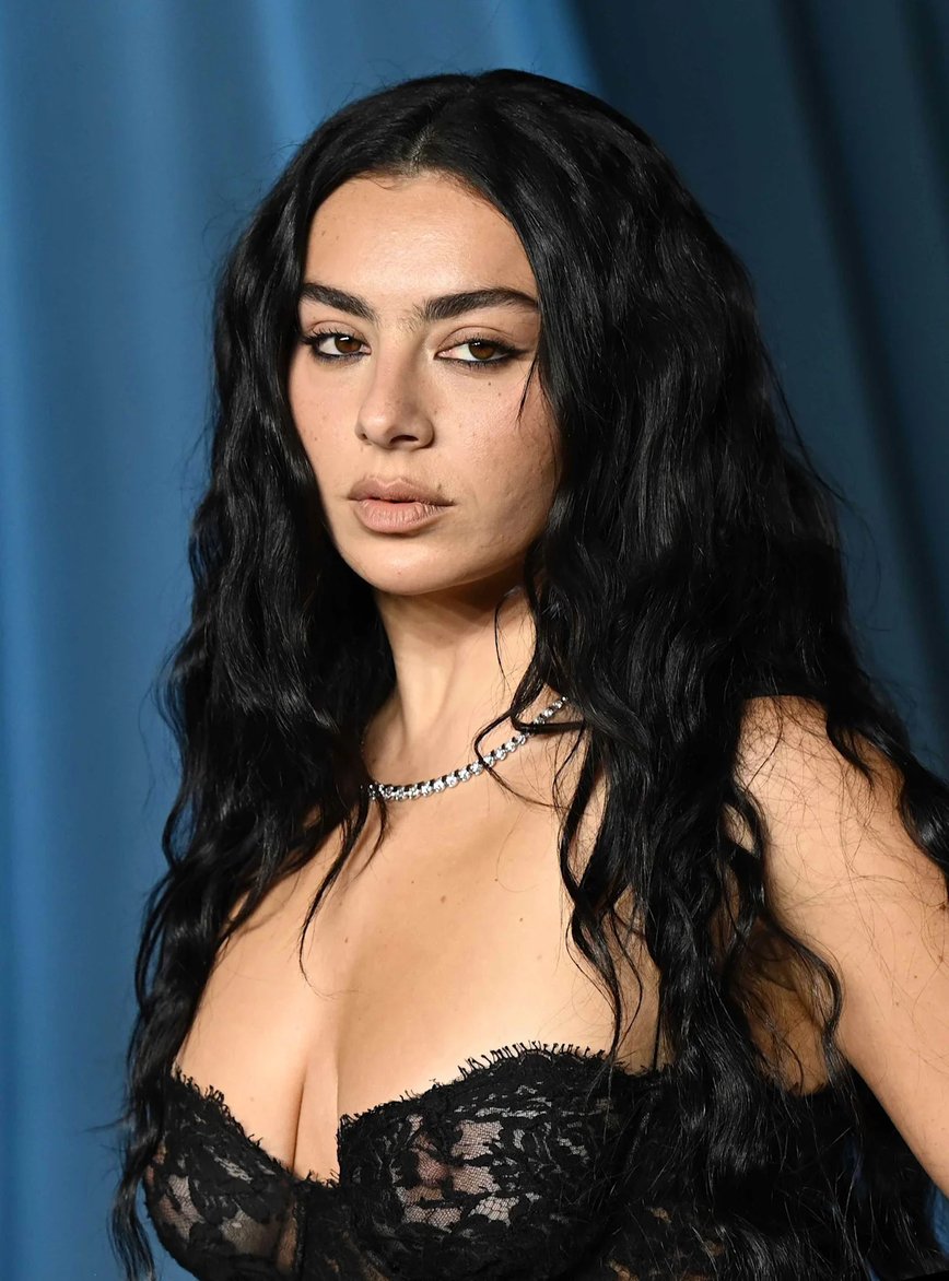 Charli XCX Slays Summer Style with a Chic Gucci LBD and Vibrant Heels