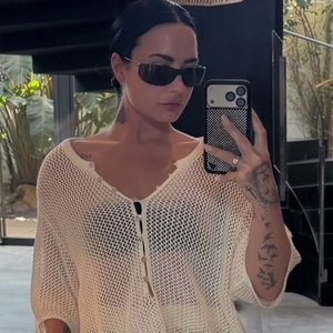 Demi Lovato's Sheer Elegance: A Bold Fashion Statement at Rosalía's LUX Tour
