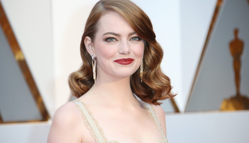 Emma Stone Steals the Show: A Look Back at Her Dazzling Oscar Red Carpet Looks