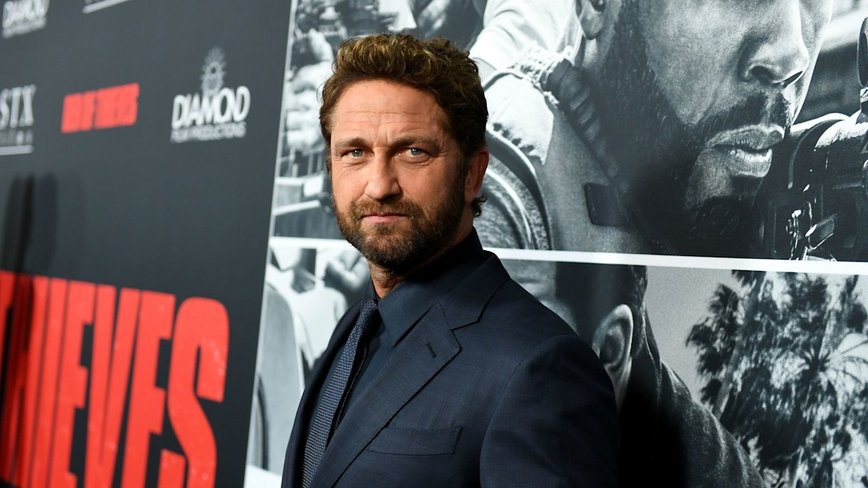 Gerard Butler Spotted with Wedding Band at LAX - Did He Tie the Knot with Morgan Brown?