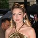 Gigi Hadid Stuns with Style Swap at Taylor Swift's Glamorous Wedding