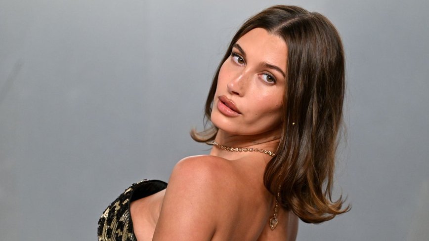 Hailey Bieber Strikes a Pose: Summer's Minimalist Swimwear Trend Takes Center Stage