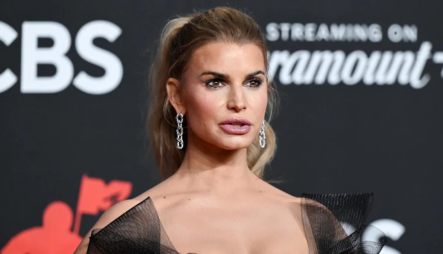 Jessica Simpson Sizzles in a Vibrant Floral Swimsuit, Serving Up Some Serious 'Summertime Vibes'