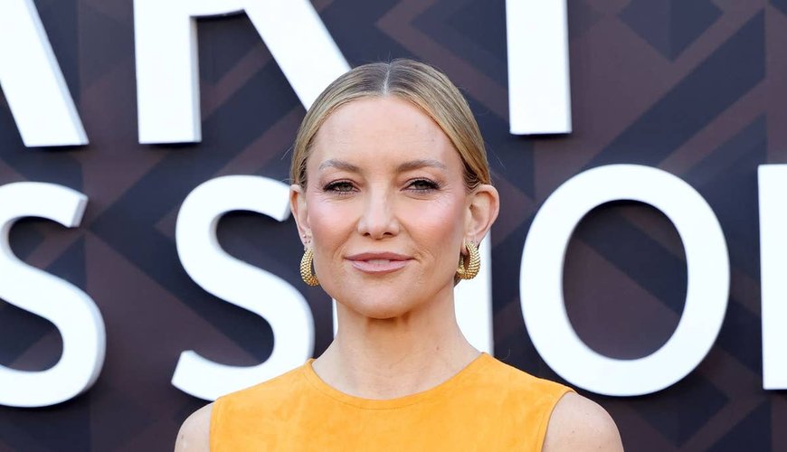 Kate Hudson Stuns in Bold Orange Gown at LA Premiere
