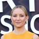 Kate Hudson Stuns in Bold Orange Gown at LA Premiere