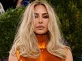 Kim Kardashian Lifts the Curtain on Her Latest Bold Fashion Moment