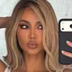 Kim Kardashian Channels Hollywood Glam with Iconic Look