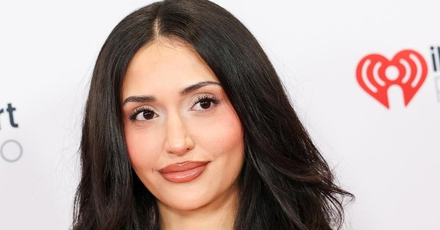 Leah Kateb Rocks the 2016 Throwback with a Daring Bodysuit Snap