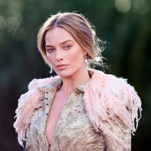 Margot Robbie's Boots Take Center Stage - Maison Margiela Magic in Paris