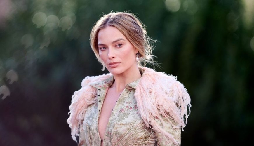 Margot Robbie's Boots Take Center Stage - Maison Margiela Magic in Paris