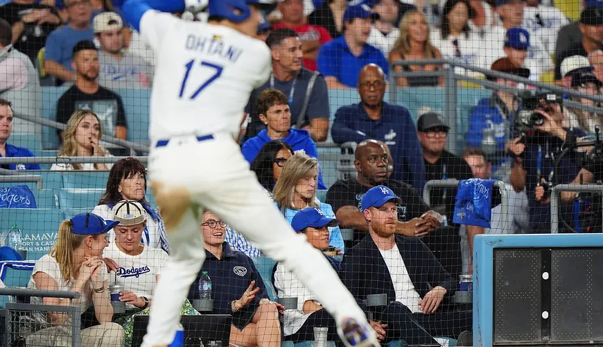 Star-Studded Night: Prince Harry, Meghan Markle, and Hollywood Icons Light Up the World Series